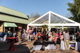 An event set-up with a large tent in Flamingo Plaza