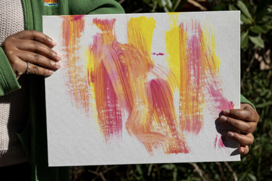 A canvas with bright paint strokes